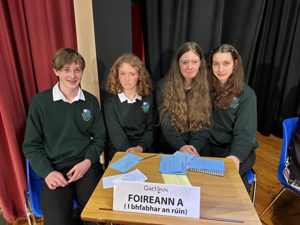 D osp ireacht Debating Gaelchol iste Phort L irge